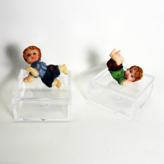 Scatoline con bimbo in resina