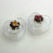 Scatolina cuore in plastica rigida con fiore in ceramica tipo capodimone