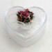Scatolina cuore in plastica rigida con fiore in ceramica tipo capodimone