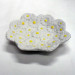 Piattino in ceramica bianca con margherite